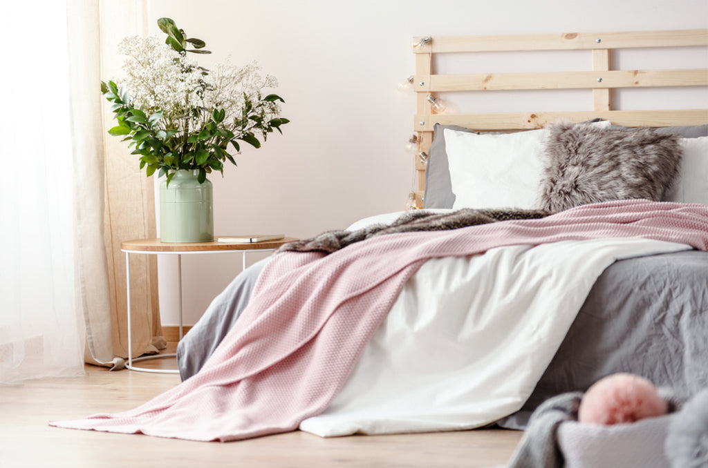 cotton bed sheets on the bed